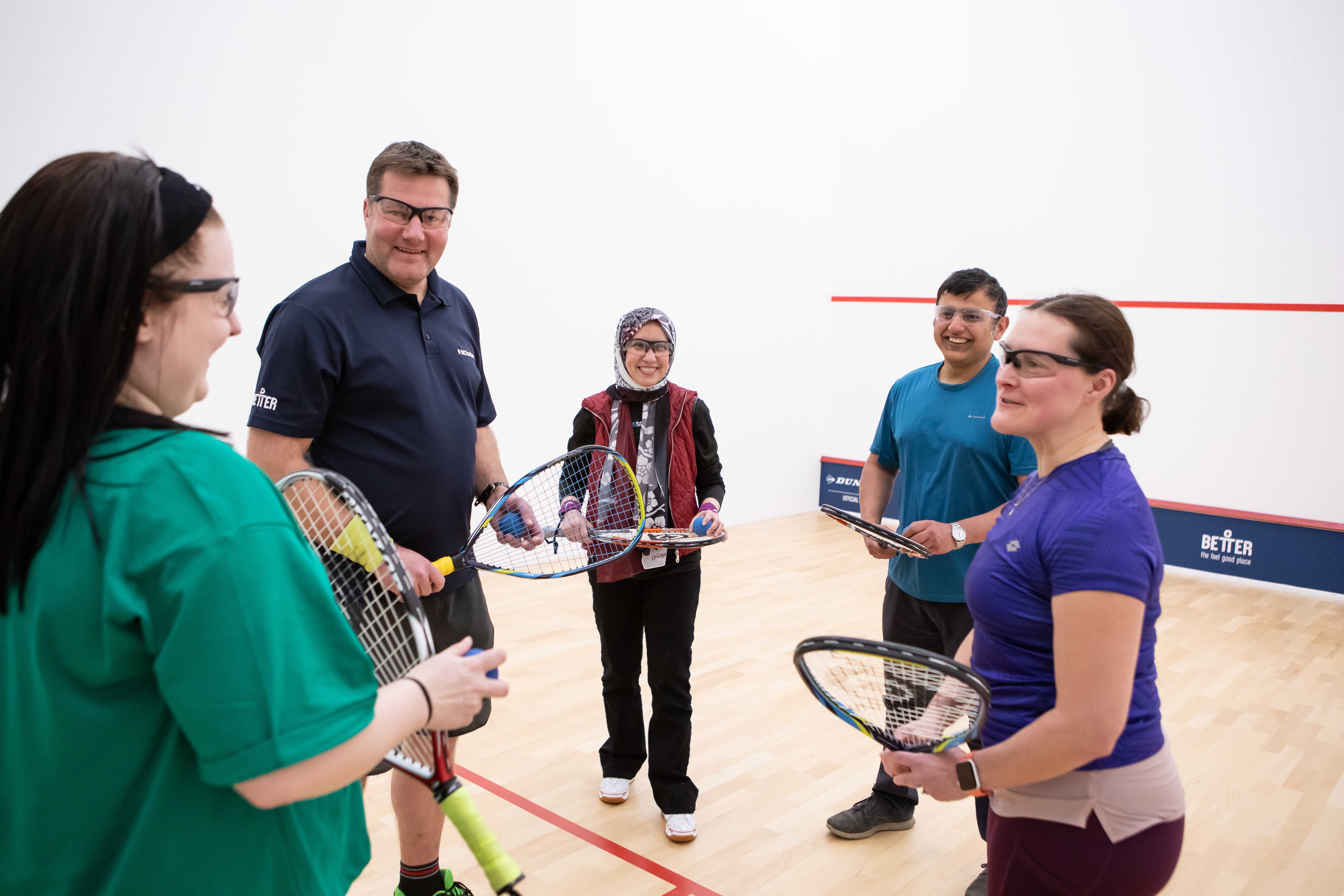 People playing squash
