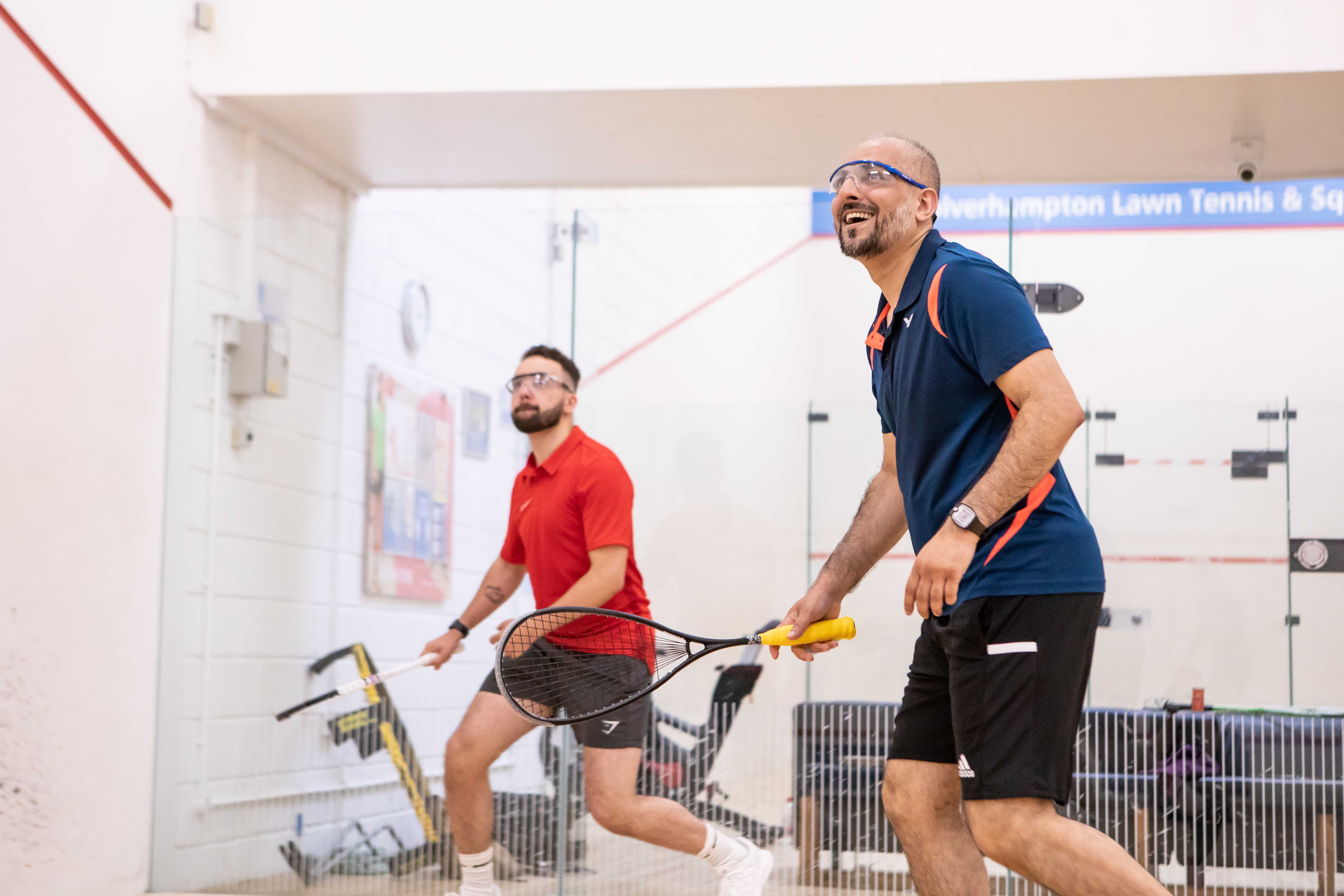 People playing squash
